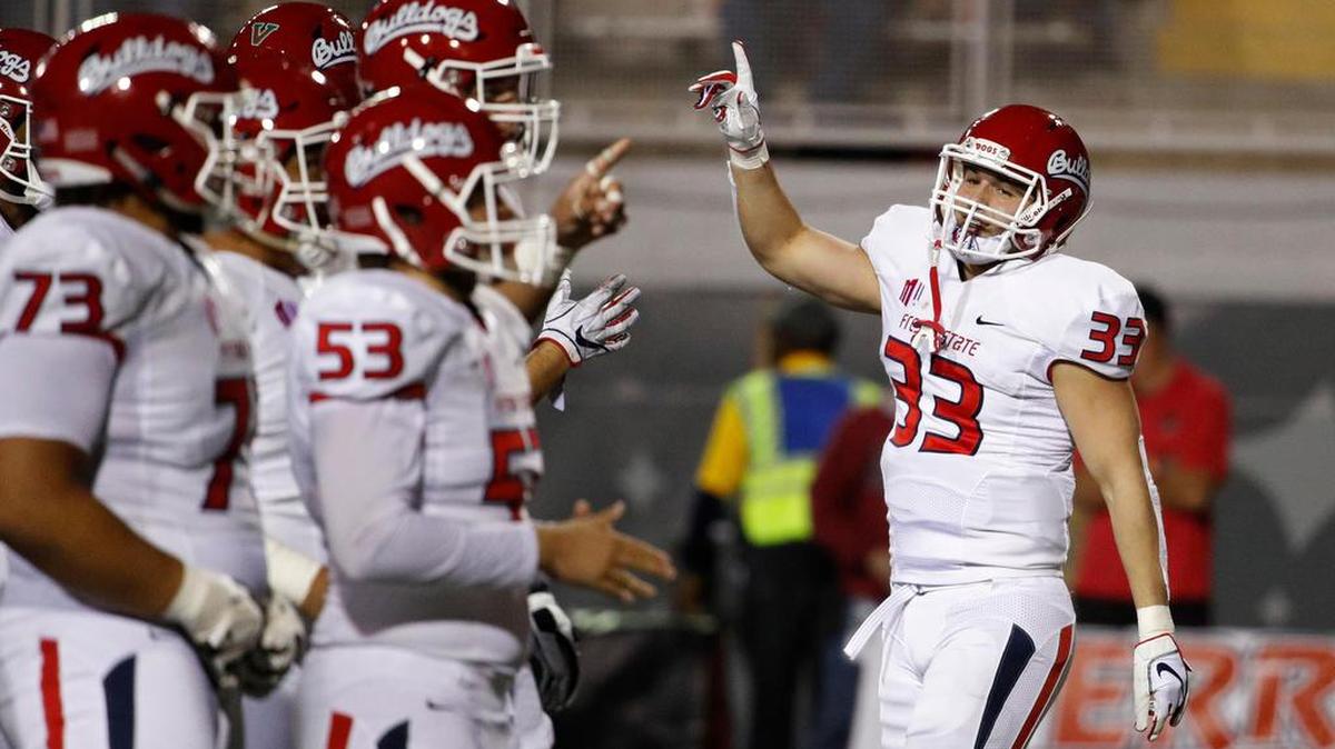 Fresno State running back Josh Hokit (33) celebrates after scoring on a 5-yard run in the Bulldogs’ 48-3 victory over the UNLV Rebels at Sam Boyd Stadium in Las Vegas Saturday, Nov. 3, 2018, in Las Vegas.