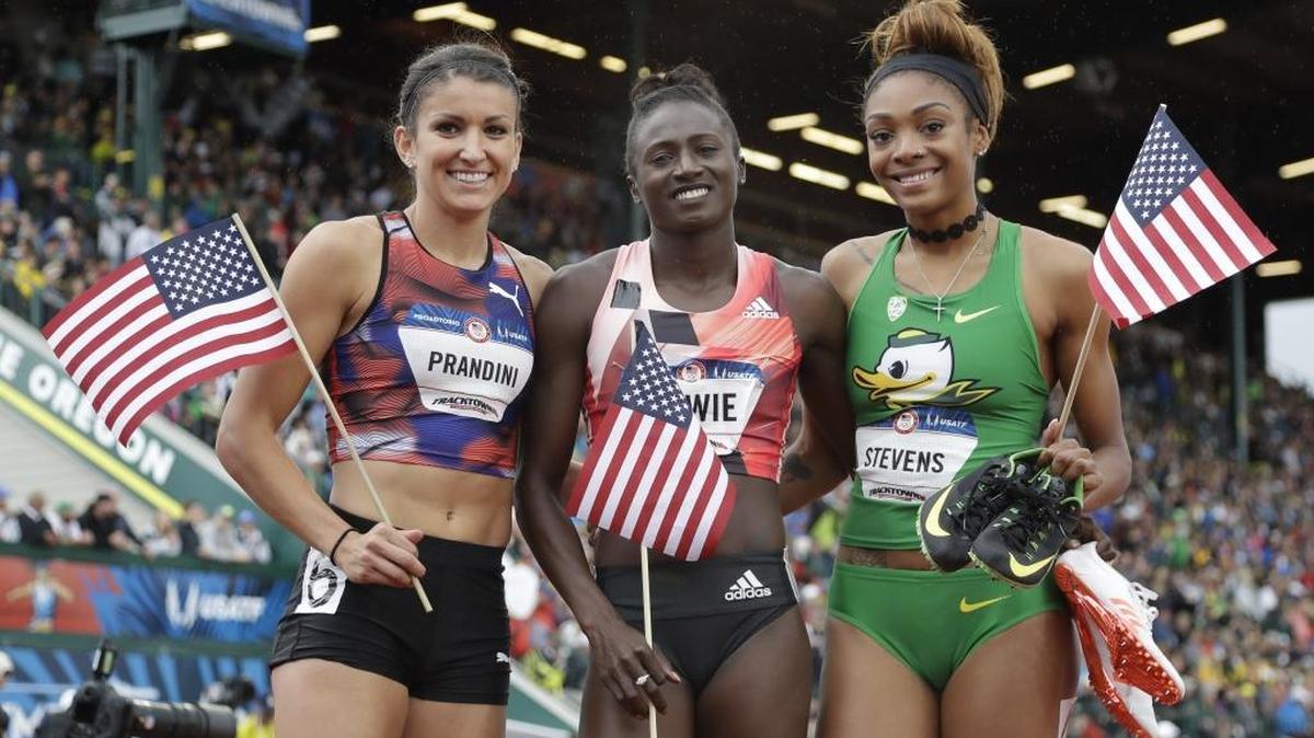Tori Bowie, center, former College of the Sequoias standout Deajah Stevens, right, and former Clovis High star Jenna Prandini celebrate their 1-2-3 finish in the finals of the 200 at the U.S. Olympic Track and Field trials on Sunday in Eugene Ore.