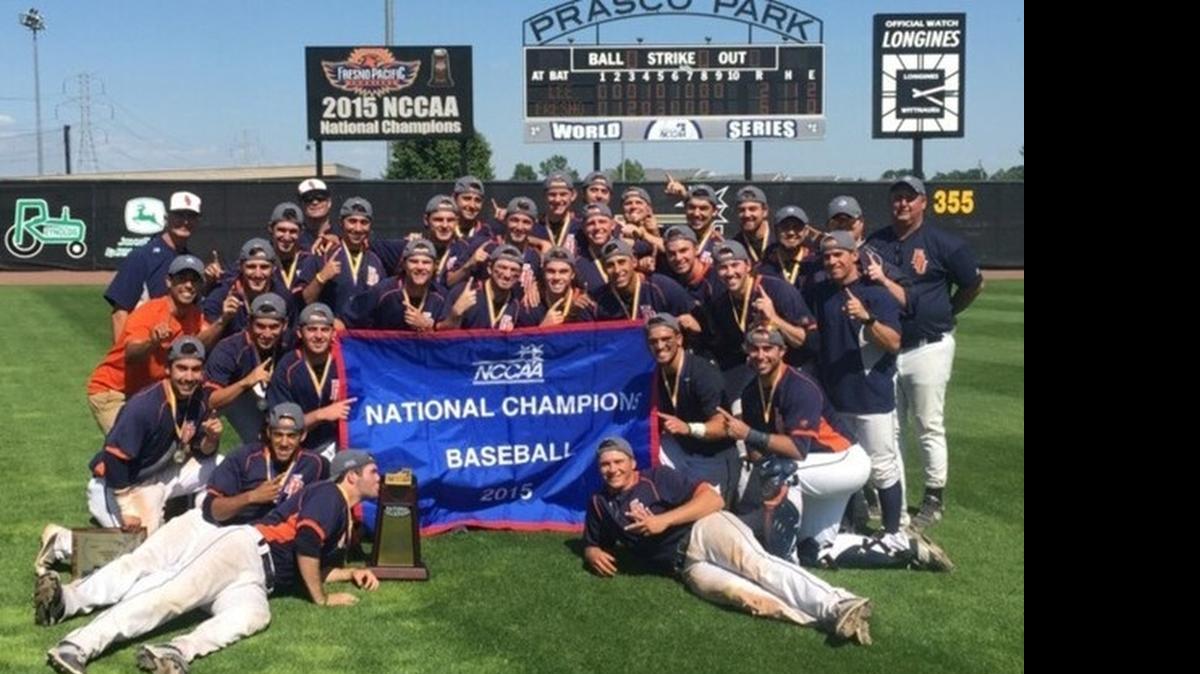 
Fresno Pacific players and coaches pose with the spoils of a second straight National Christian College Athletic Association World Series championship on Saturday in Mason, Ohio.
