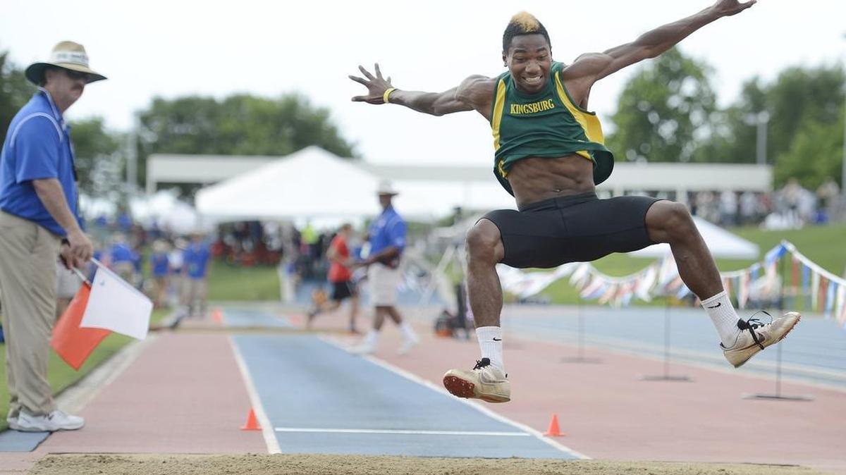 
Kingsburg High’s Emmett Brooks jumps in the preliminary round of the boys long jump at the CIF State Track & Field Championships on June 6, 2015, at Veterans Memorial Stadium. The stadium has added another jewel to the string of elite state and national-level events it hosts with the announcement Sept, 16, 2015, that it has landed the U.S. Track and Field Junior Outdoor Championships.
