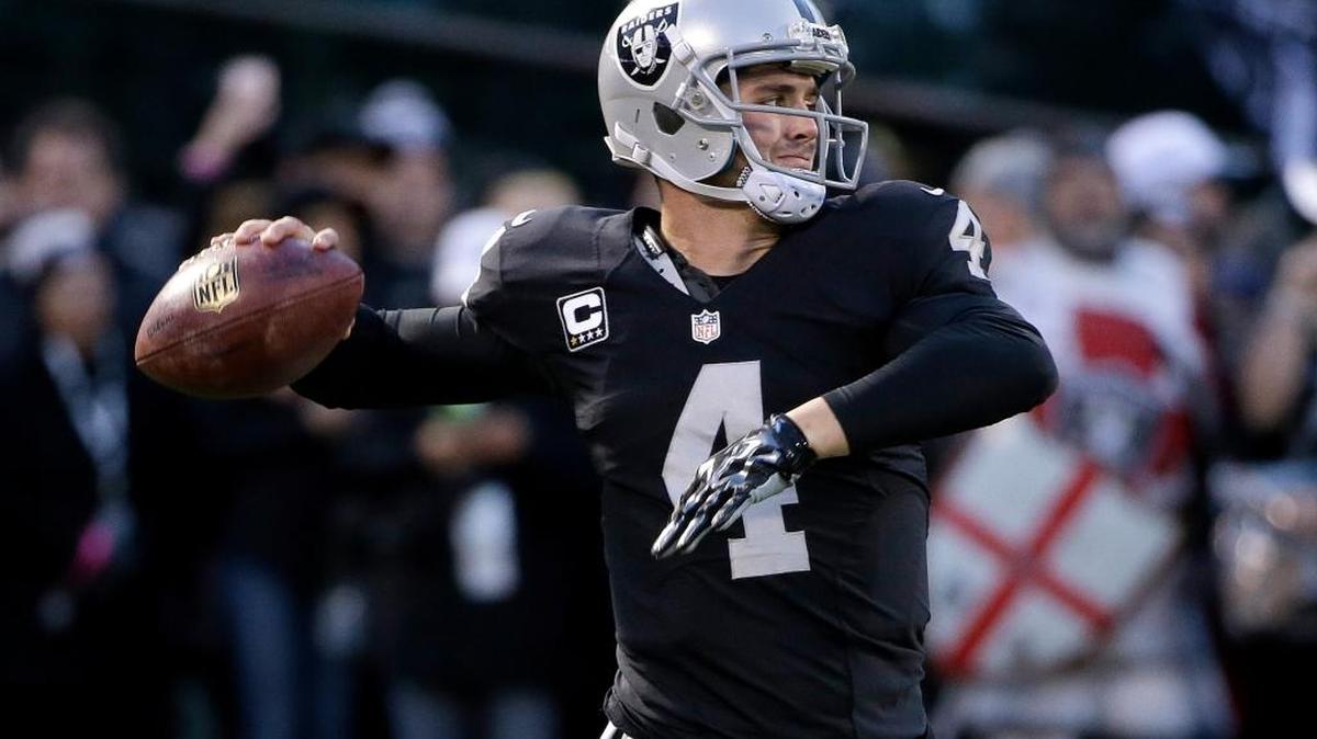 Oakland Raiders quarterback Derek Carr warms up before an NFL football game against the San Diego Chargers on Thursday, Dec. 24, 2015, in Oakland, Calif. The Raiders won 23-20.
