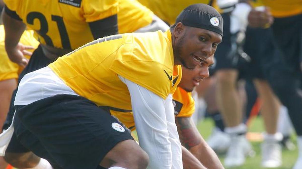 
Pittsburgh Steelers safety Robert Golden, bottom, leads the defense during organized team activity drills last month in Pittsburgh. Golden is back in Fresno for his third annual football camp at Bulldog Stadium.

