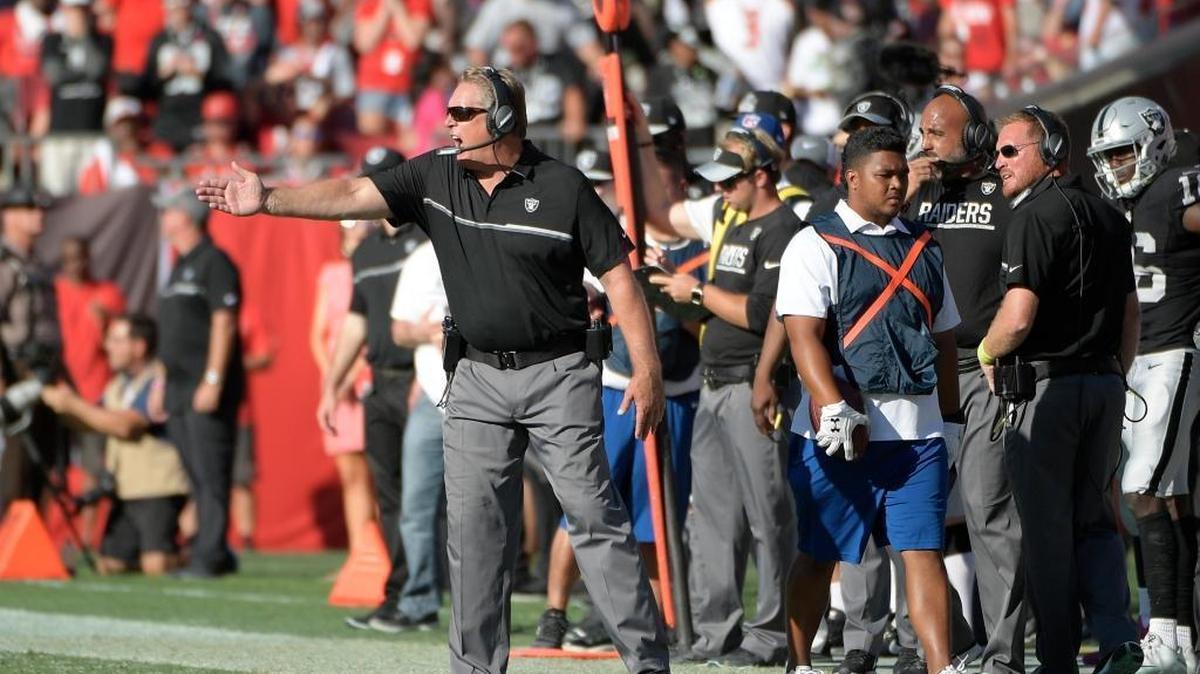Oakland Raiders coach Jack Del Rio argues a call on the sideline during overtime of an NFL football game against the Tampa Bay Buccaneers, Sunday, Oct. 30, 2016, in Tampa, Fla.