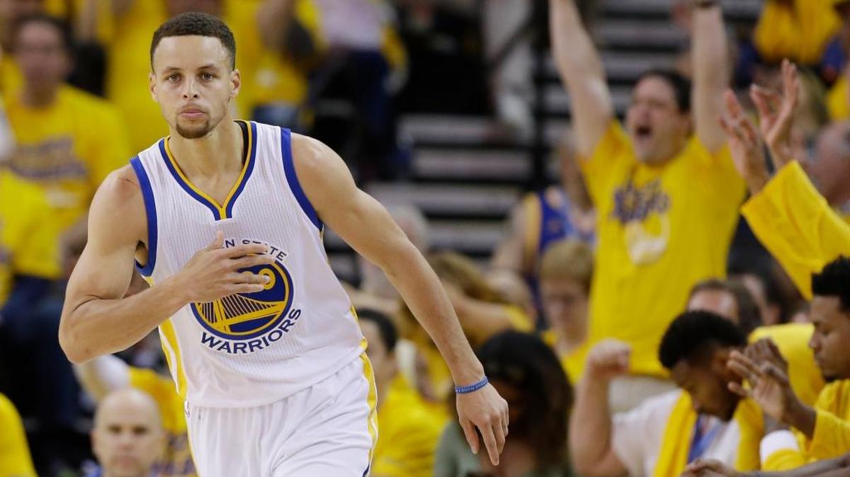 Stephen Curry of the Golden State Warriors led the NBA with 402 made three-point shots this season, breaking his record from last season. ... Curry reacts during Game 1 of a first-round NBA basketball playoff series against the Houston Rockets on Saturday, April 16, 2016, in Oakland.
