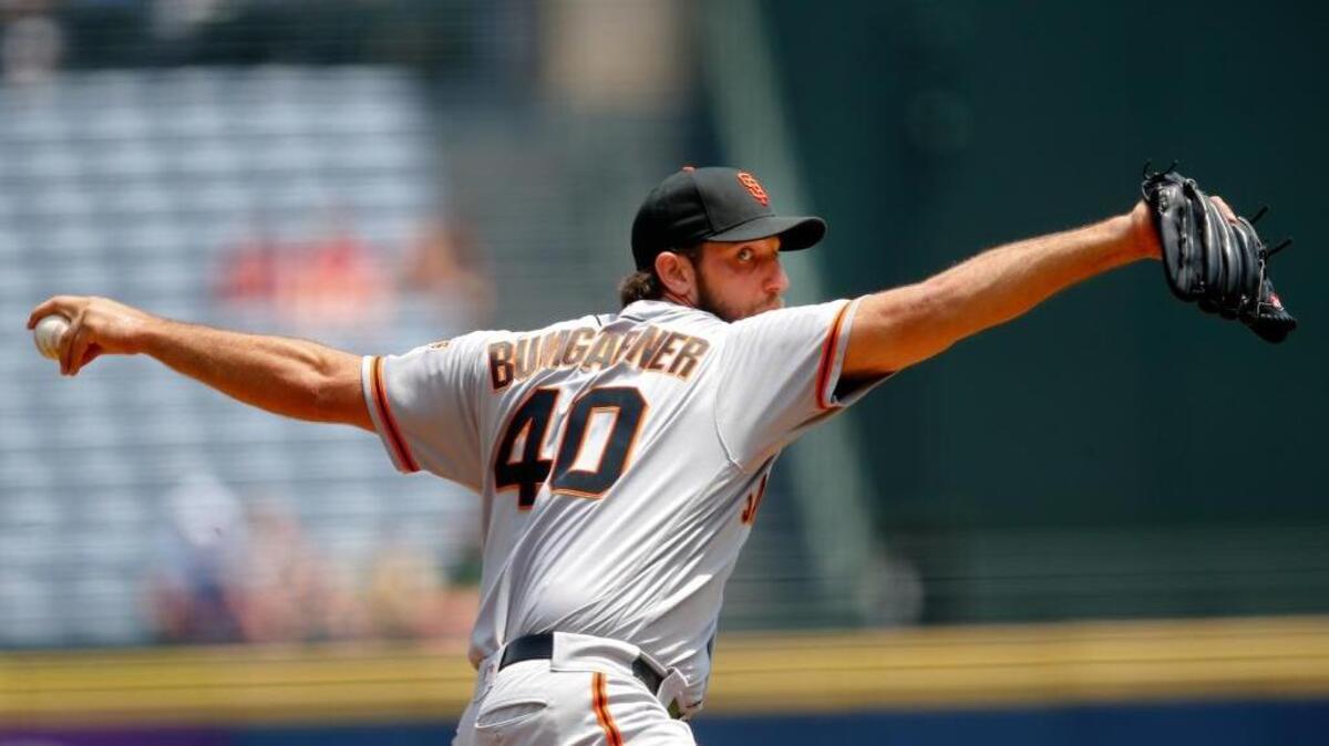 Giants ace Madison Bumgarner threw 7 2/3 shutout innings in Atlanta on Thursday, striking out 11 Braves in a 6-0 victory.
