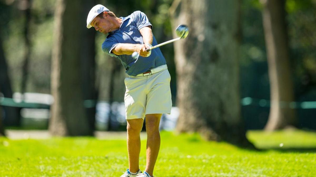 
Bryson DeChambeau plays his tee shot on the 14th hole during the semifinal round of match play of the U.S. Amateur on Aug. 22, 2015, at Olympia Fields Country Club in Olympia Fields, Ill.
