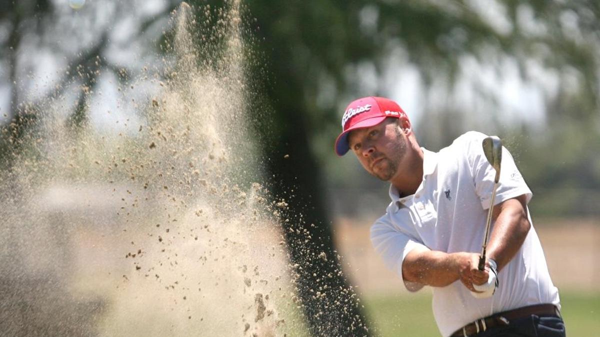 Danny Paniccia, pictured chipping out of a trap during his 2012 tournament win, leads the field of 148 after Day 1 of the 89th Fresno City Amateur Golf Championship at Riverside Golf Club.