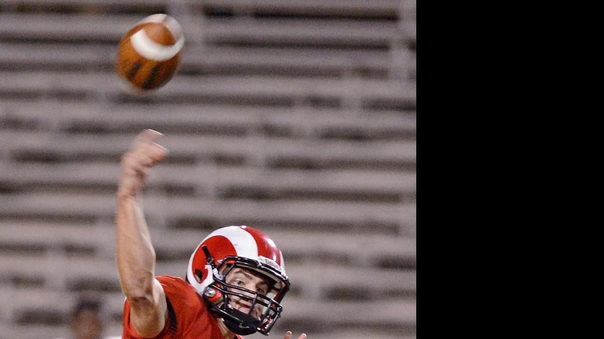
Fresno City College quarterback Christian Rossi, firing off a pass against Butte College last September, has been named the Rams’ starting quarteback for their season opener Sept. 5 at De Anza College in Cupertino.
