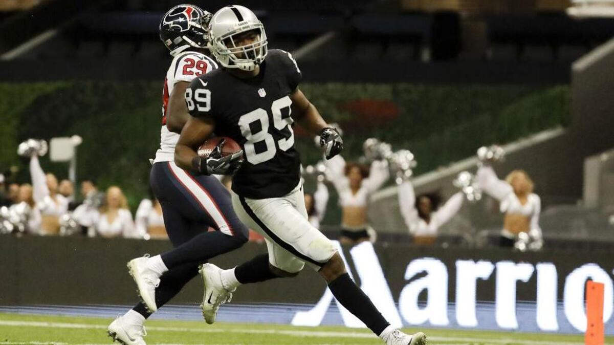 Oakland Raiders wide receiver Amari Cooper scores the decisive touchdown during an NFL football game against the Houston Texans Monday, Nov. 21, 2016, in Mexico City.