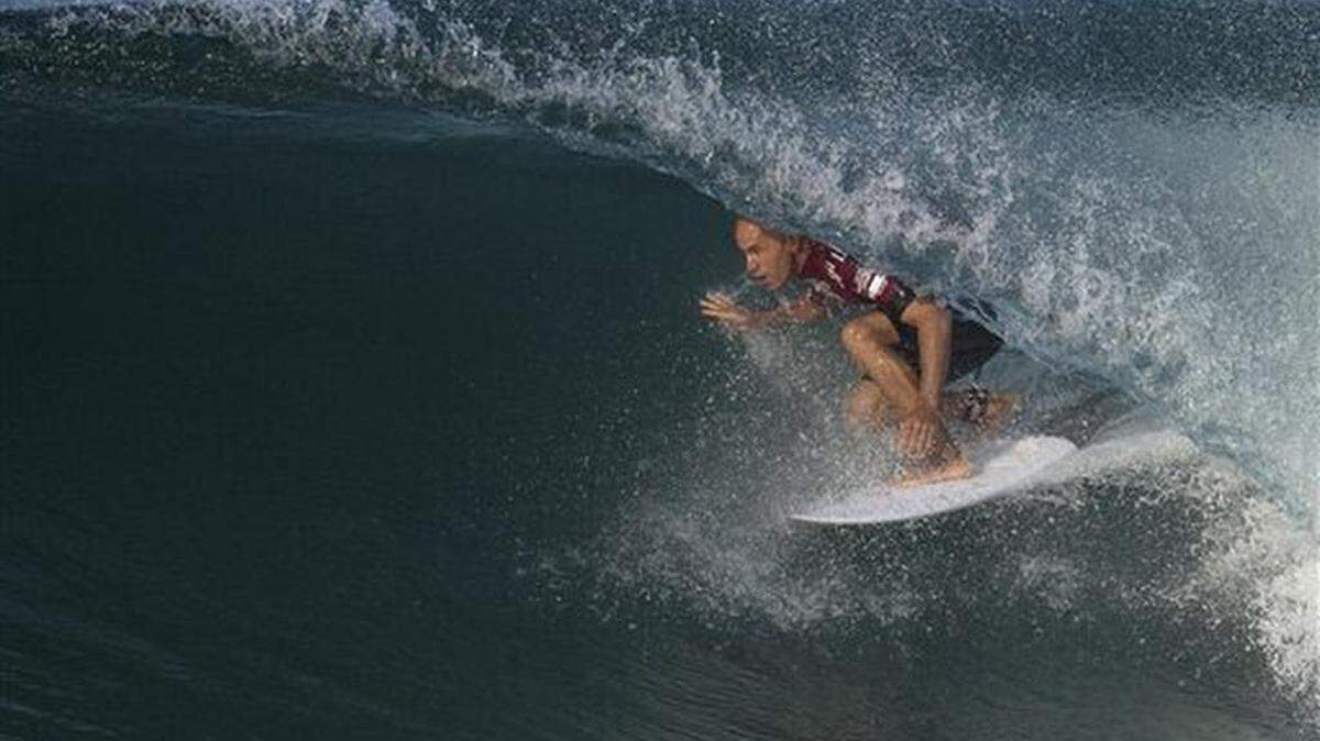 FILE - In this May 12, 2015 file photo, U.S. surfer Kelly Slater competes in the 2015 Oi Rio Pro World Surf League competition at Barra da Tijuca beach in Rio de Janeiro, Brazil.