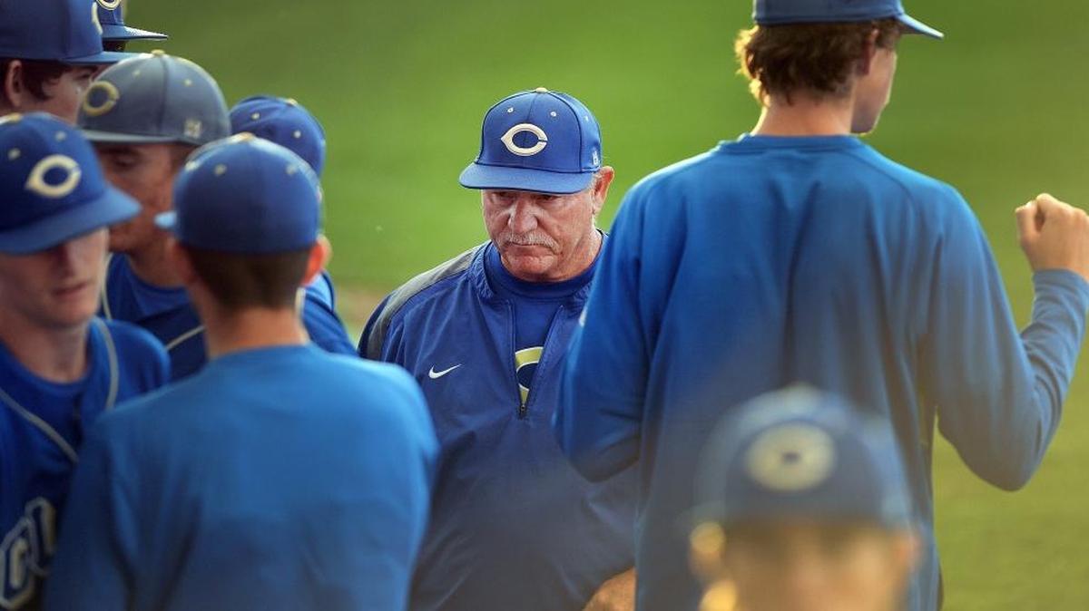 Clovis High baseball coach James Patrick, center, tied Mike Noakes as the winningest baseball coaches in Central Section history Friday night, when Clovis defeated Clovis West 3-1.