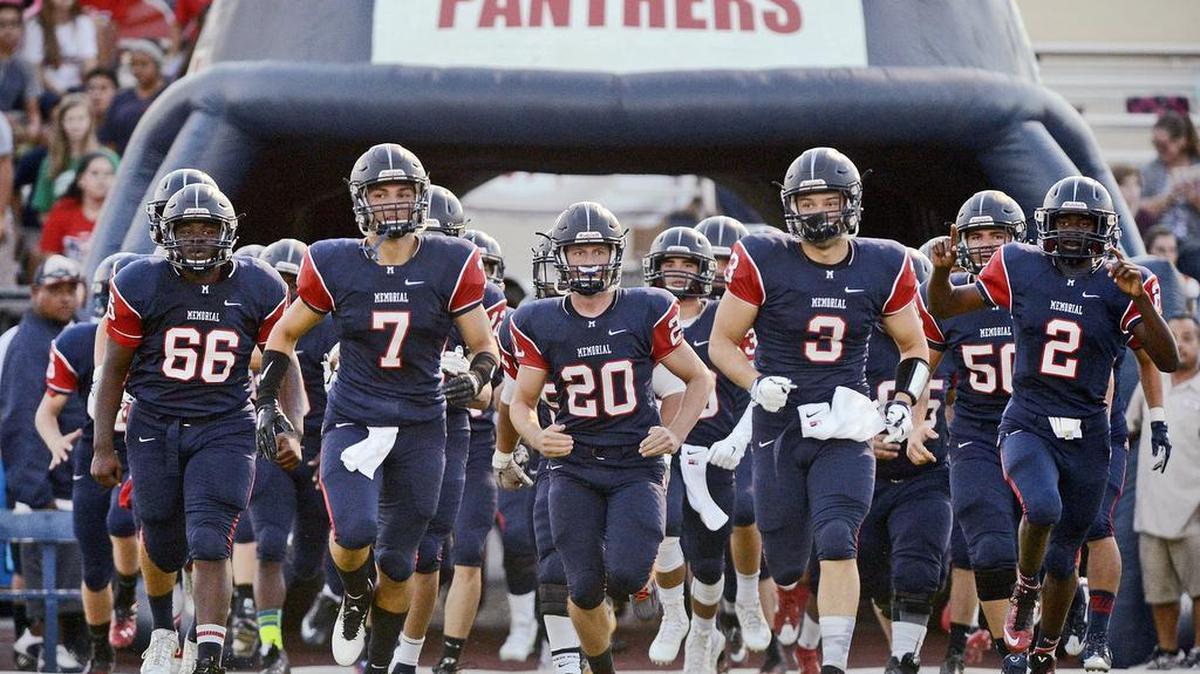 
Memorial High players head to the field to take on Washington in an opening week game of the Central Section football season Aug. 28, 2015. Memorial came out on top 10-7.
