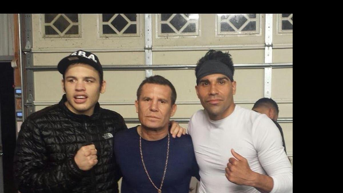 
Pro boxer Joe Louie Lopez of Fresno, right, with Julio Cesar Chavez Jr, left, and legendary boxer Julio Cesar Chavez, middle.
