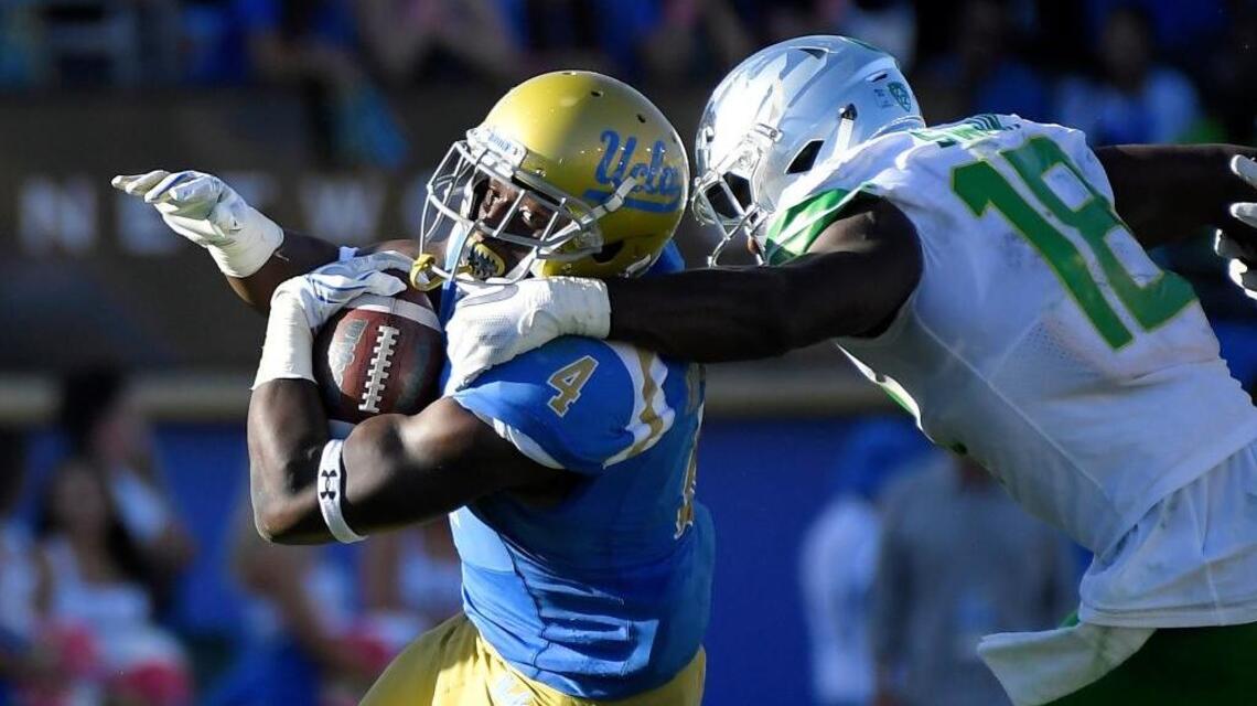 See former Clovis North star Bo Olorunfunmi climb his way to a touchdown for UCLA
