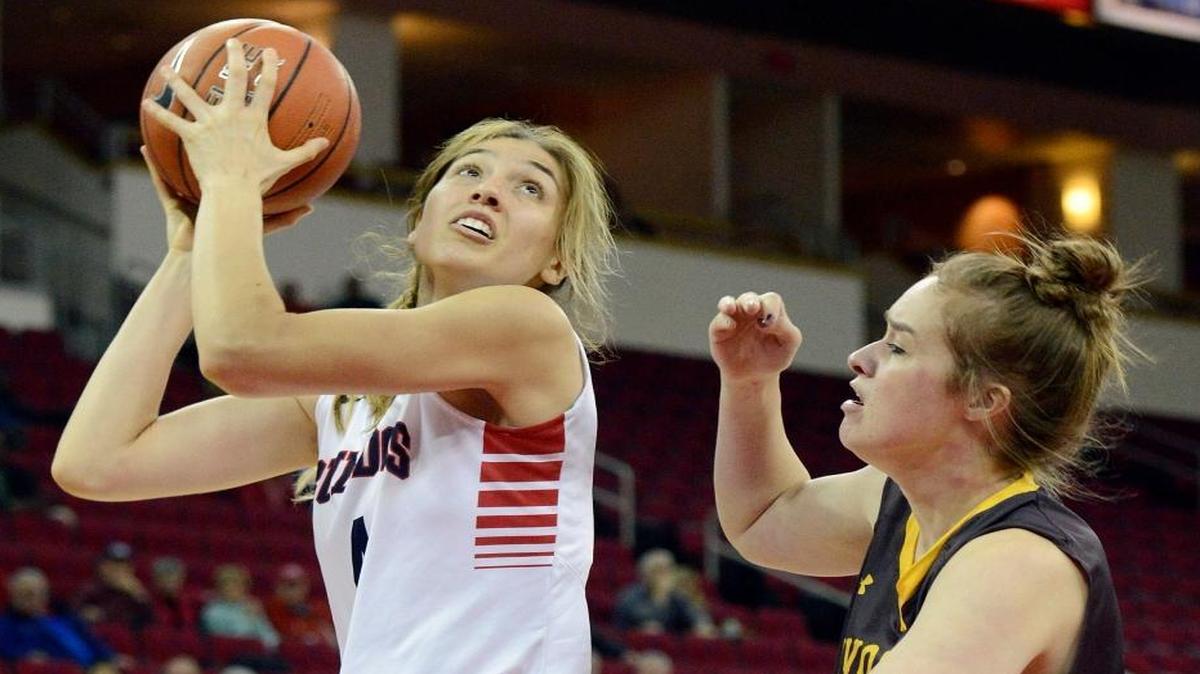 Fresno State’s Bego Faz Davalos, left, turns for a shot at the hoop while defended by Wyoming’s Marleah Campbell in their game this season at the Save Mart Center. Faz Davalos was named Mountain West Conference Player of the Week on Monday, Feb. 29, 2016.