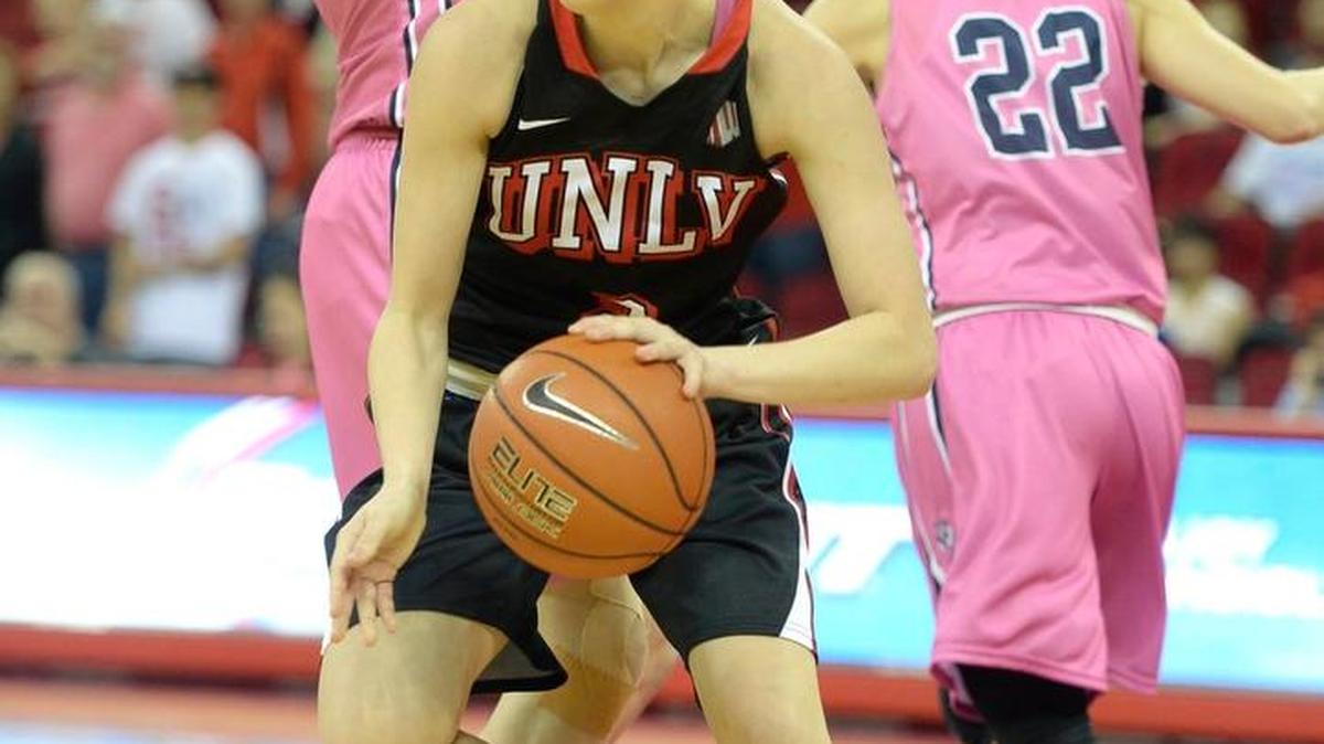 Former Hanford player, UNLV's Brooke Johnson takes down a rebound during their game against Fresno State on Feb. 11, 2015. Johnson, a 6-foot sophomore guard, has started 20 games for the Rebels and is second on the team in scoring at 12.9 points per game.