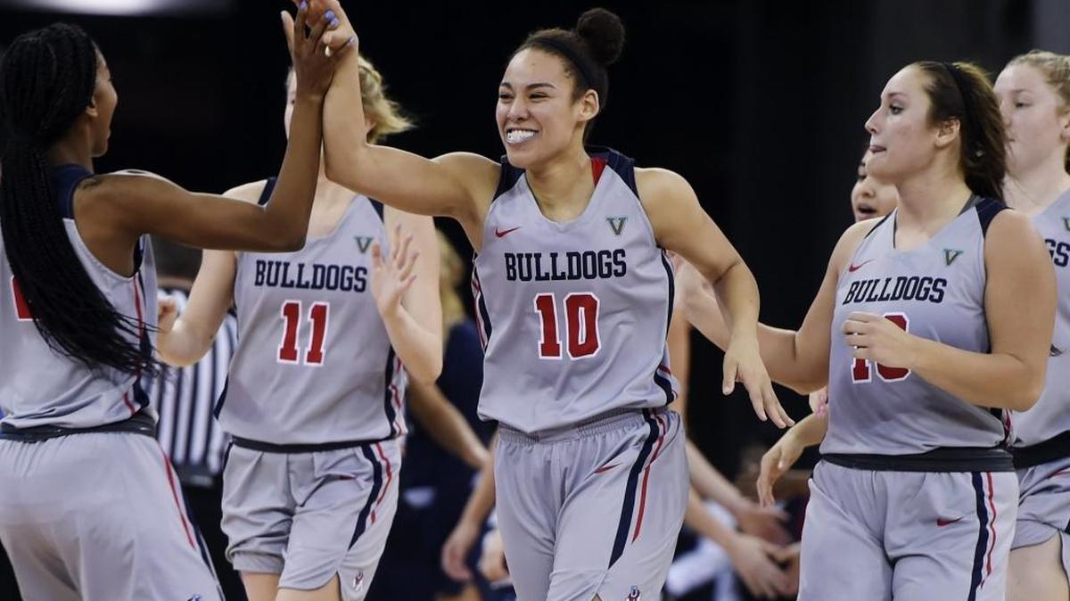 Fresno State’s Candice White, after hitting 4 of 4 free throws down the stretch, celebrates a 57-56 win against Utah State in the Mountain West Conference home opener Wednesday, January 3. 2018.