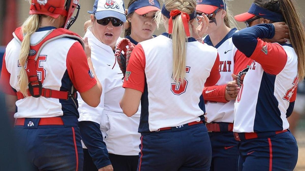 Fresno State coach Trisha Ford gathers the team for a meeting at the circle in their regular-season finale against UNLV at Margie Wright Diamond on May 14, 2016.