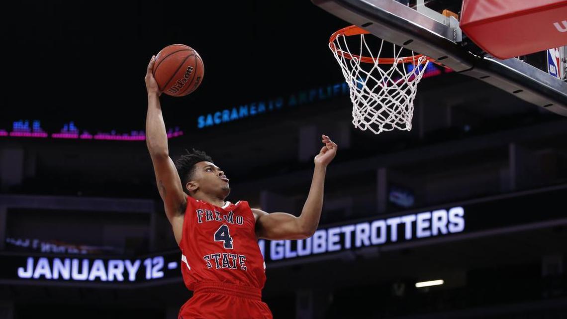 Fresno State’s Niven Hart goes up for a dunk against Saint Mary’s during the second half of an NCAA college basketball game in Sacramento, Calif., Wednesday, Nov. 20, 2019. Saint Mary’s won 68-58. (AP Photo/Rich Pedroncelli)