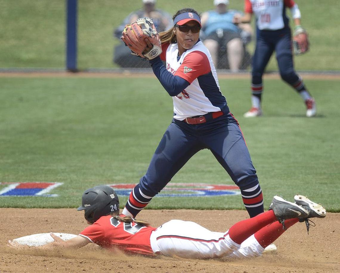 Fresno State’s Malia Rivers, top, forces out UNLV’s Courtney Beavers before attempting a double-play in their regular season finale at Margie Wright Diamond Saturday, May 14, 2016.