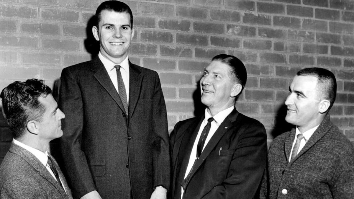 Dick Francis, right, in his early years of coaching wrestling at Fresno High. He’s pictured with two other coaches who played a big part in the progress of Fresno State wrestler Eddie Davies, second from left. The other coaches are Hans Wiedenhoefer, left, Fresno City College; and Max Kimberley, Fresno State, second from right. Dr. Francis went on to coach at McLane High and Fresno State. He died Sunday, Nov. 19.