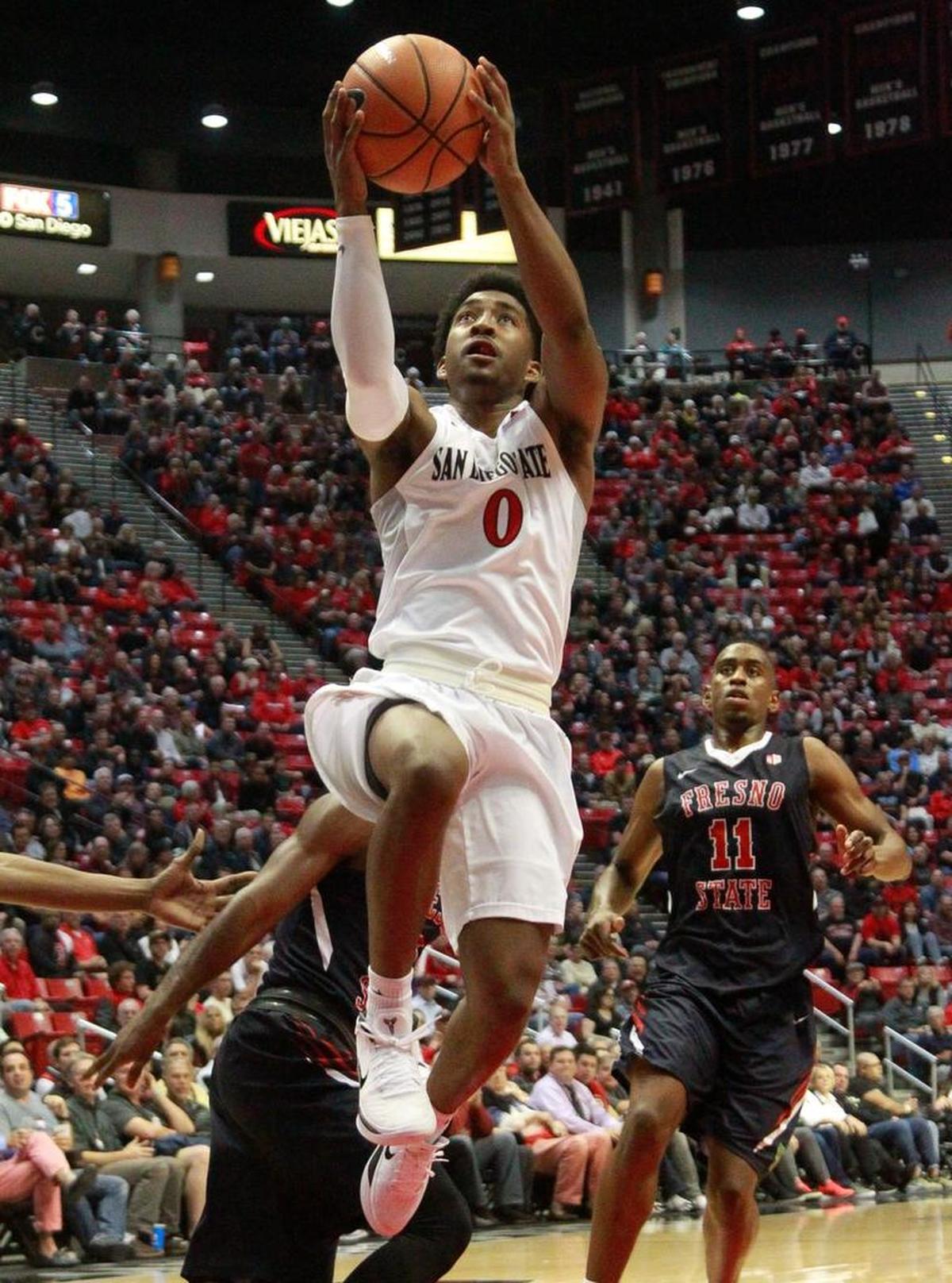 San Diego State guard Devin Watson drives to the basket during a 77-73 loss to Fresno State at the Viejas Arena in San Diego on Wednesday, Jan. 17, 2018. Watson scored 11 points and had three assists.