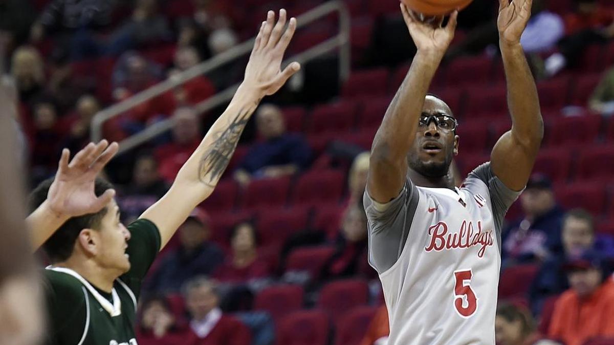 Fresno State’s Jahmel Taylor, right, lines up a 3-point shot as Colorado State’s Anthony Bonner attempts to close in Wednesday, Jan. 18, 2017. Taylor hit 5 of 9 from distance and the Bulldogs railed 11 in all in beating Colorado State 78-57.