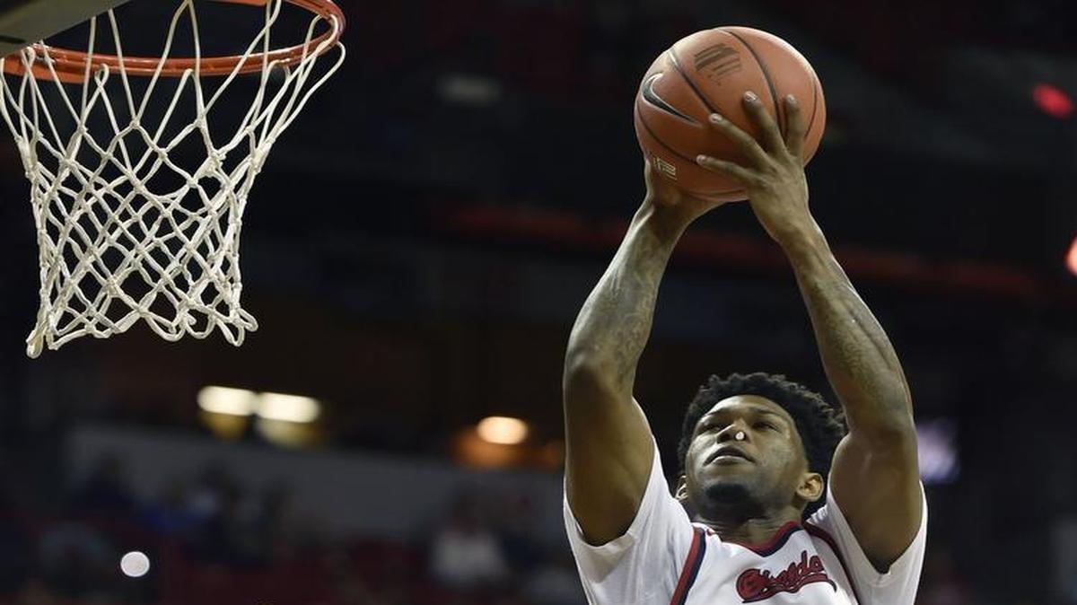 Fresno State’s Julien Lewis (0) shoots against UNLV during the second half of an NCAA college basketball game at the Mountain West Conference men’s tournament Thursday, March 10, 2016, in Las Vegas.