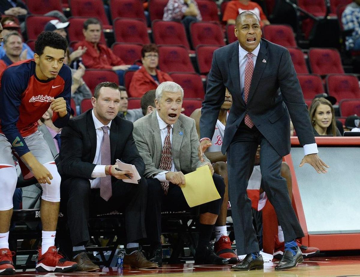 Fresno State men’s basketball coach Rodney Terry, right, encourages his team during the second half of its exhibition game against UC Merced at the Save Mart Center on Friday, Nov. 3, 2017.