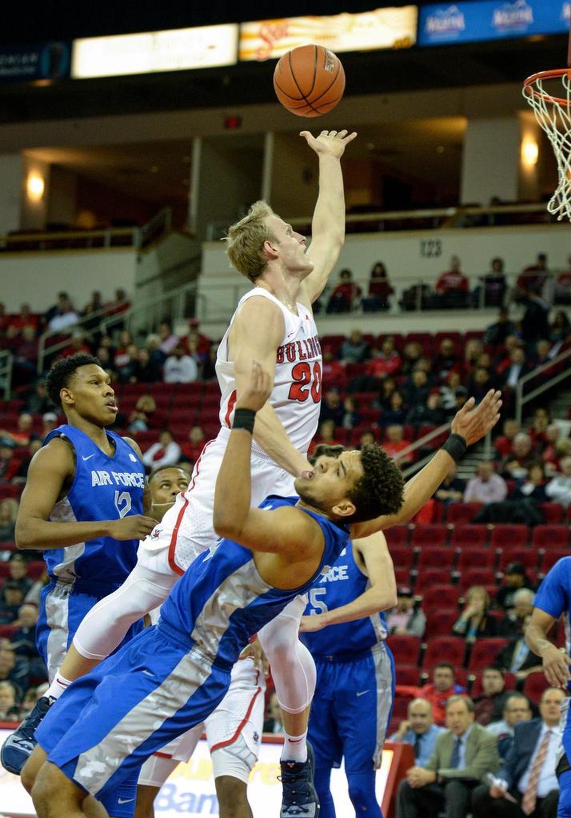 Fresno State forward Sam Bittner, center, gets called for a charge as he runs into Air Force’s Ryan Swan during the Bulldogs’ 64-61 loss to the Falcons on Wednesday, Feb. 20, 2019.
