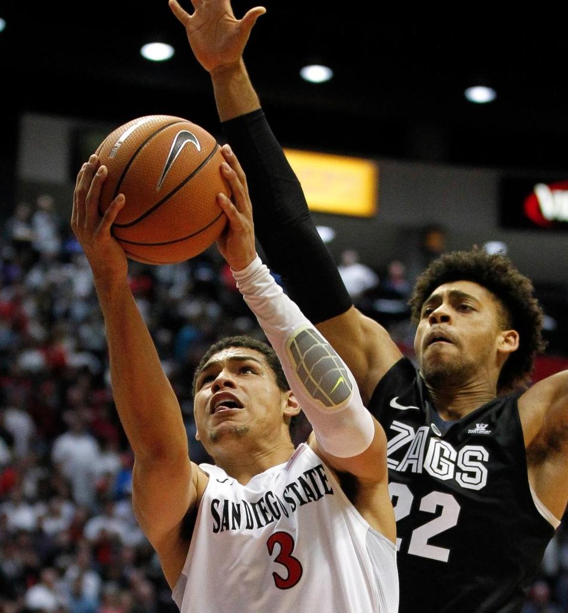 San Diego State guard Trey Kell goes up for a shot as Gonzaga’s Jeremy Jones defends during the Aztecs’ 72-70 victory at the Viejas Arena in San Diego on Dec. 21. Kell has averaged 18.5 points in regular-season games against Fresno State the past two years.