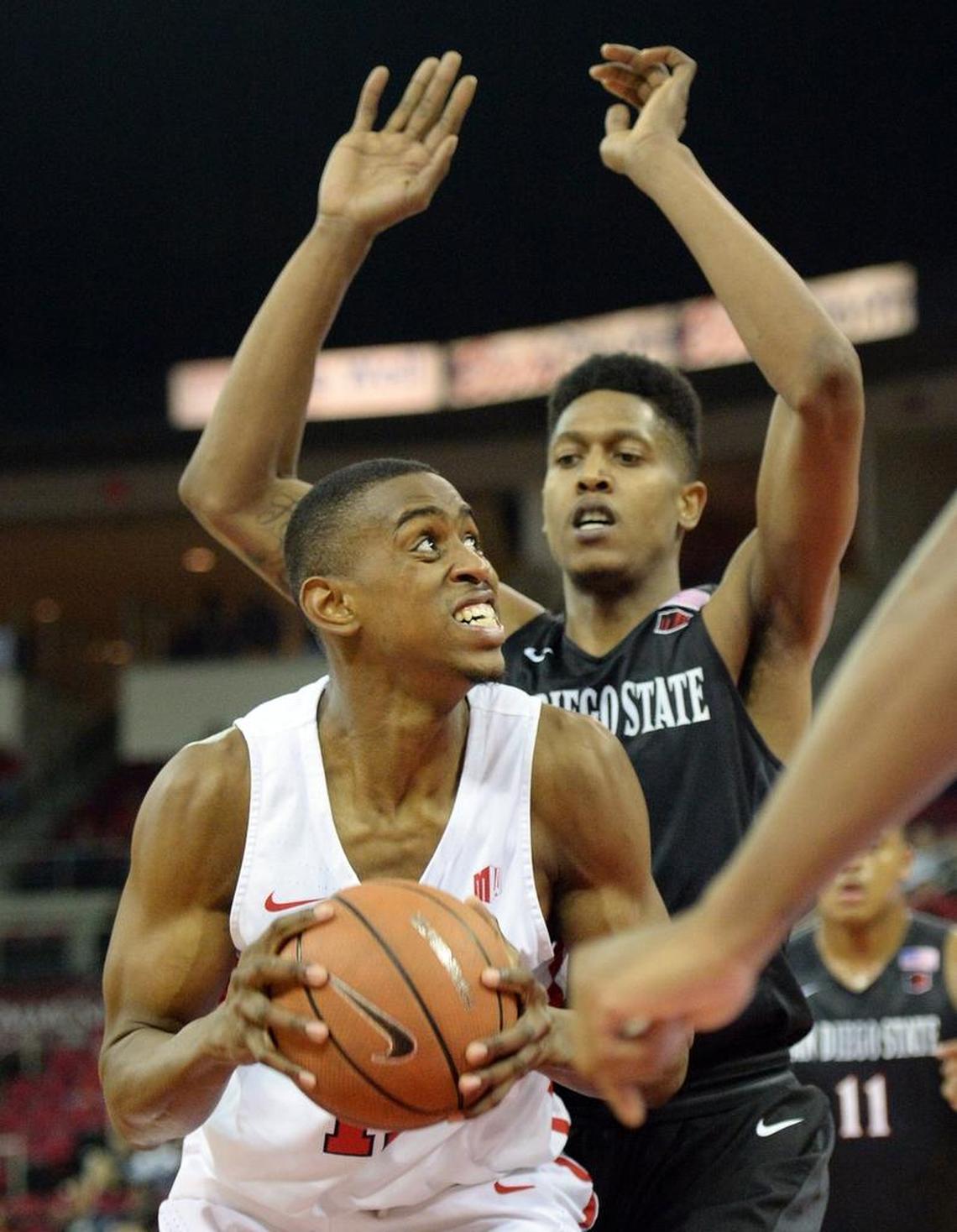 Fresno State forward Bryson Williams, left, looks to take a shot at the hoop while guarded by San Diego State’s Malik Pope in the Bulldogs’ 79-61 victory over the Aztecs at the Save Mart Center in Fresno on Tuesday, Feb. 6, 2018.