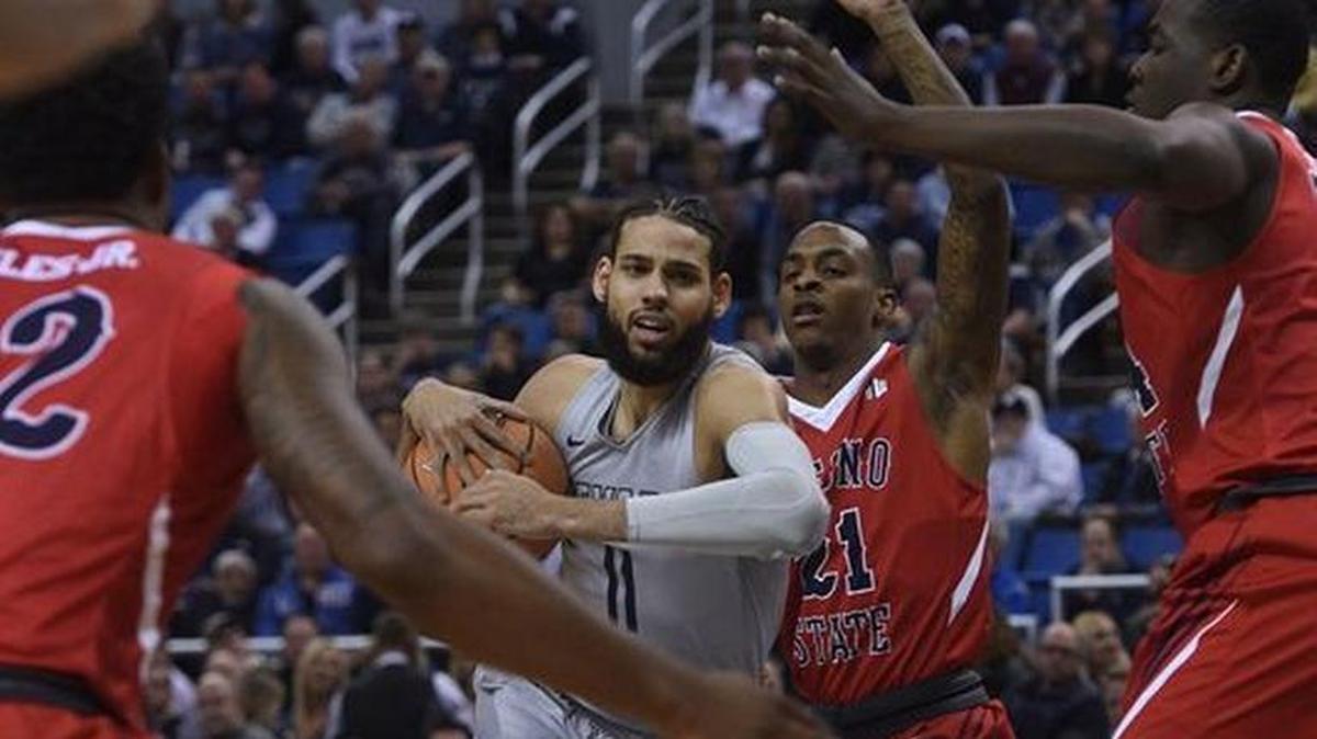 Nevada’s Cody Martin splits the Fresno State defense. “Pace for our team is everything,” Martin said after the Wolf Pack’s 102-92 victory Wednesday, Jan. 31 in Reno. “We have so many athletic guys and so many ballhandlers that we can just get a rebound and push it. We have to take more advantage of that, pushing the ball and having a faster pace to our game.