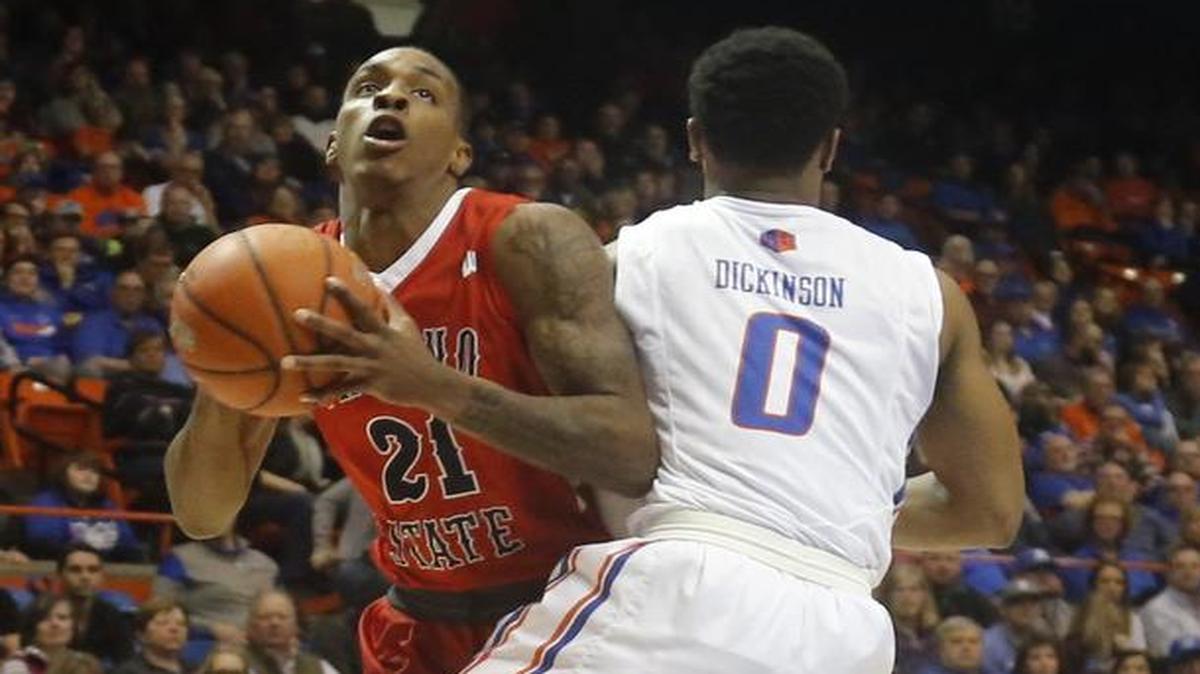 Fresno State’s Deshon Taylor (21) looks to get to the basket past Boise State’s Marcus Dickinson (0) during the first half of an NCAA college basketball game in Boise, Idaho, Tuesday, Feb. 28, 2017. Fresno State won 74-67.