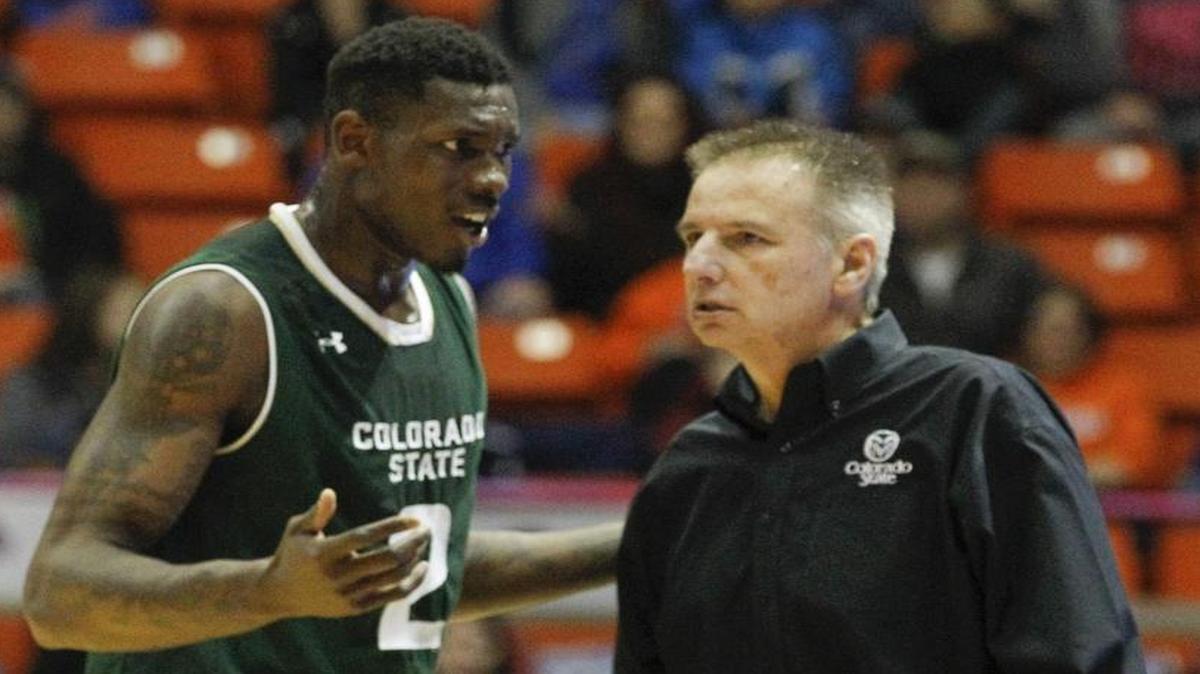 Colorado State’s Emmanuel Omogbo talks with coach Larry Eustachy during a Dec. 31 game.
