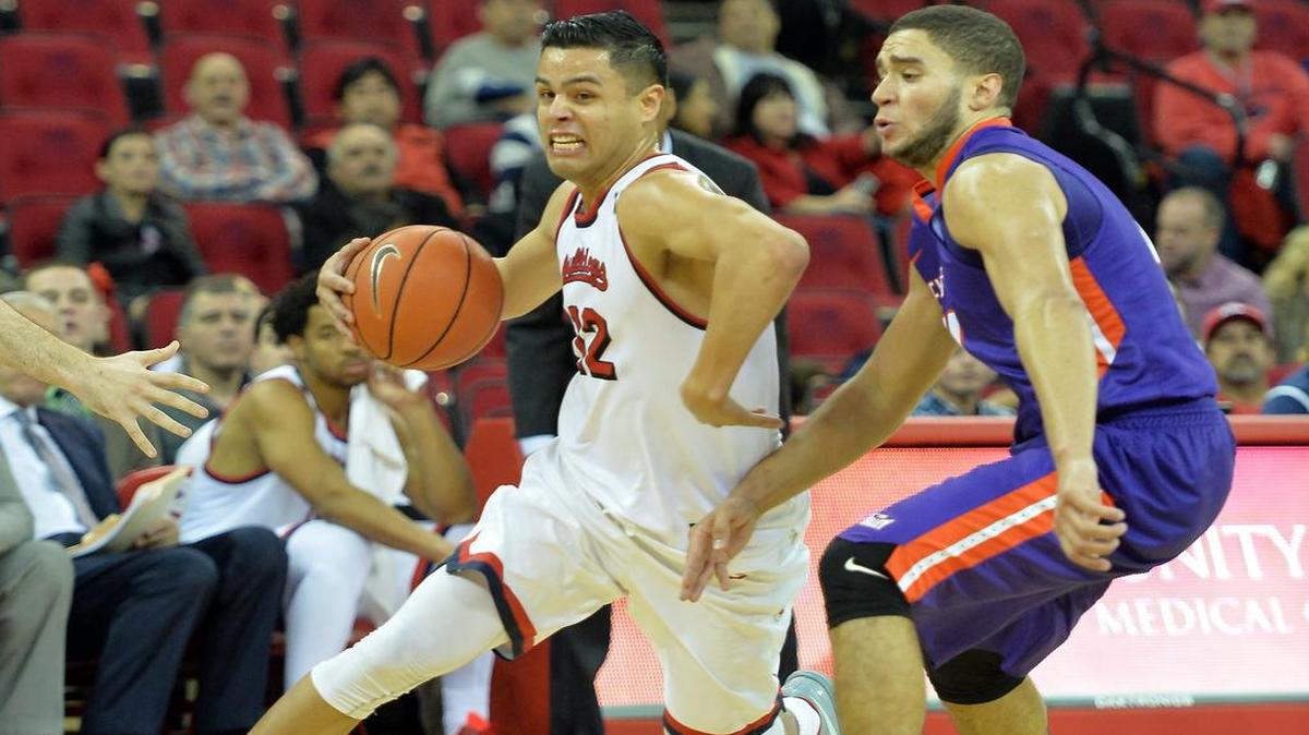 Senior guard Cezar Guerrero, at left driving past Evansville’s D. J. Balentine in December, arrived at Fresno State in coach Rodney Terry’s first season, transferring in from Oklahoma State.