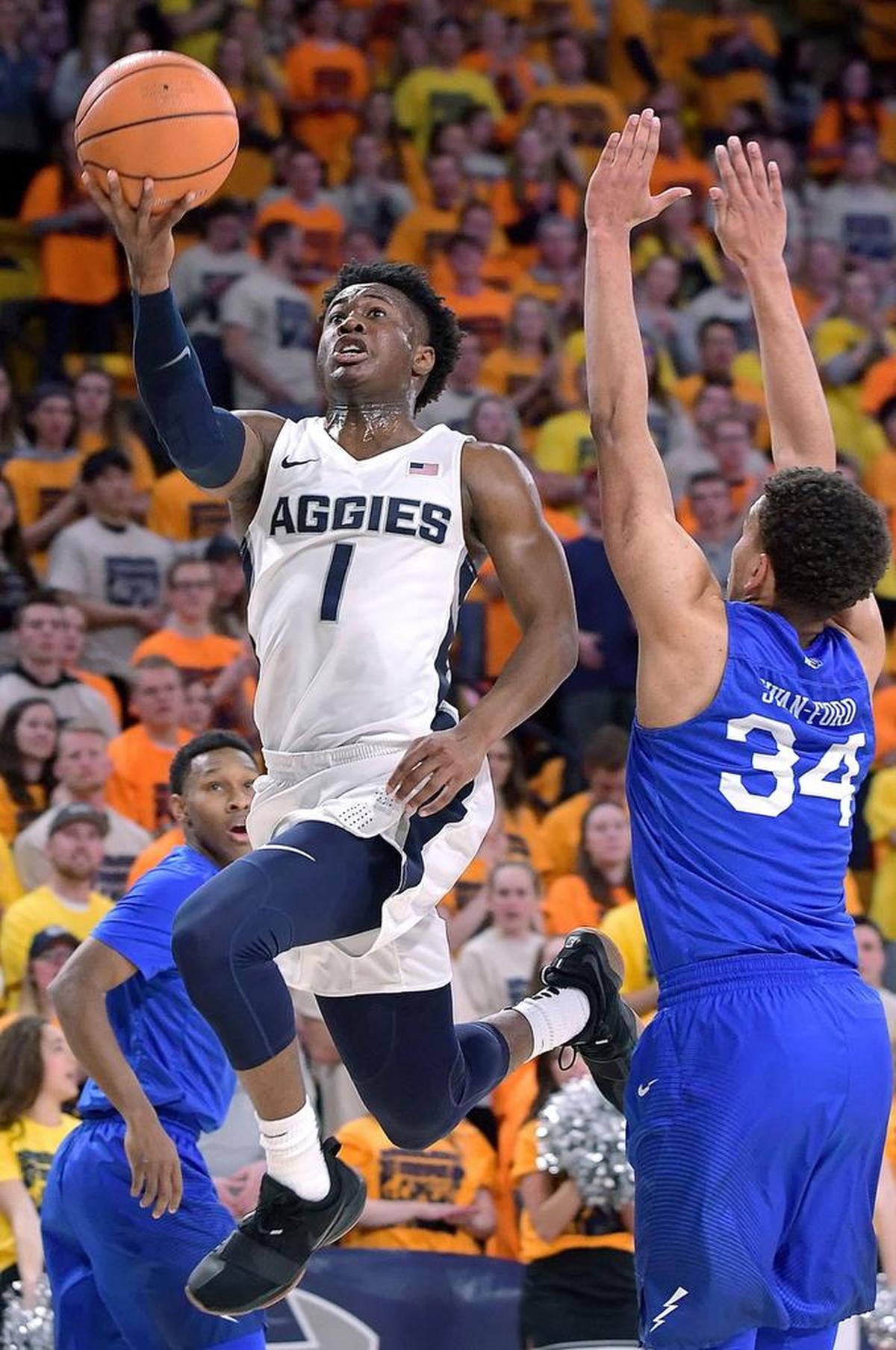 Utah State guard Koby McEwen (1) scored a game-high 28 points when the Aggies beat Fresno State 81-79 in overtime at the Dee Glen Smith Spectrum and poses an interesting matchup for the Bulldogs in the rematch on Saturday, Jan. 27 at thee Save Mart Center.