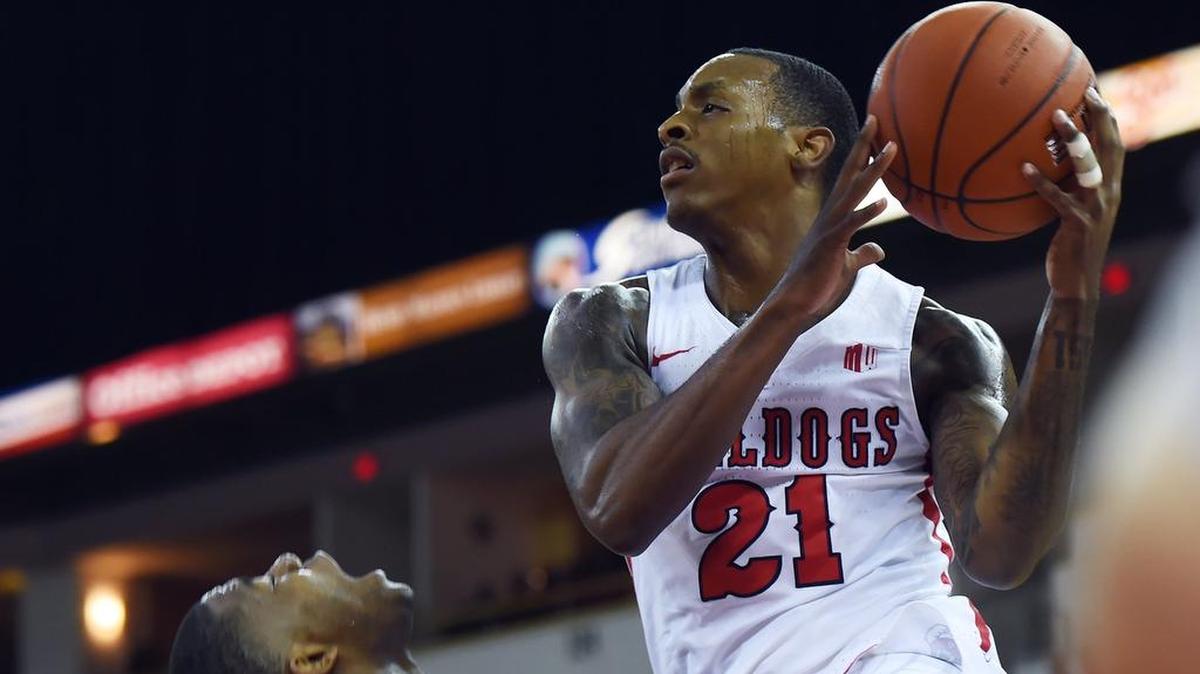 Fresno State’s DeShon Taylor, right, goes up against Pacific’s Anthony Townes, left, Wednesday night, Nov. 28, 2018 in Fresno. The Bulldogs won 81-78 in overtime.