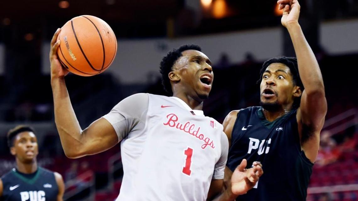 Fresno State point guard Jaron Hopkins, left, did not travel with the team for a game at San Diego State. Hopkins and guard Jahmel Taylor, both Fresno State graduates and on the Mountain West Conference all-academic team last spring, have not yet been admitted to graduate school.