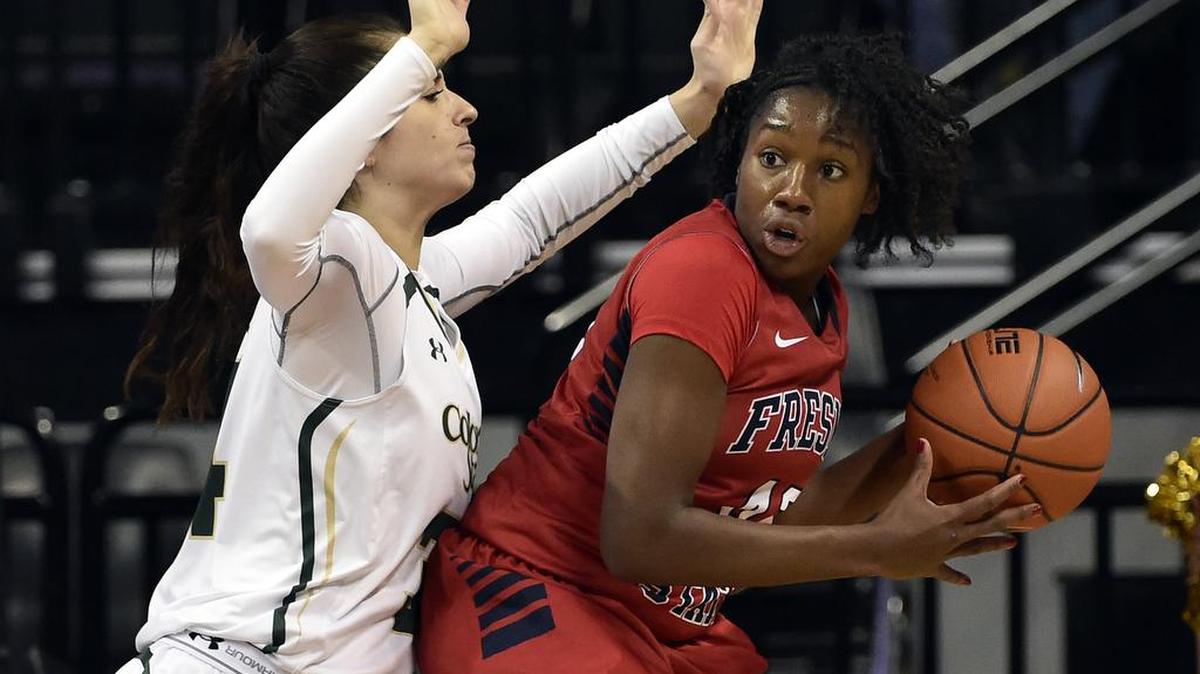 Fresno State’s Toni Smith, right, and the rest of the Bulldogs are looking to get past their loss last week to Colorado State in the Mountain West Tournament championship starting with Friday’s opening-round game of the WNIT against Santa Clara at Save Mart Center. “We can compete with these teams and we can go far in this tournament,” Smith said.