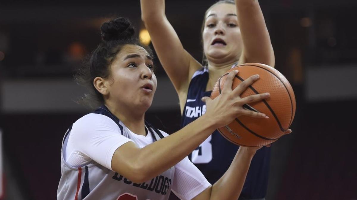 Fresno State’s Aly Gamez, left, in action Wednesday against Utah State, made a key 3-pointer Saturday, Jan. 6 to help the Bulldogs beat Colorado State 56-45. Gamez finished with 13 points and 12 rebounds.