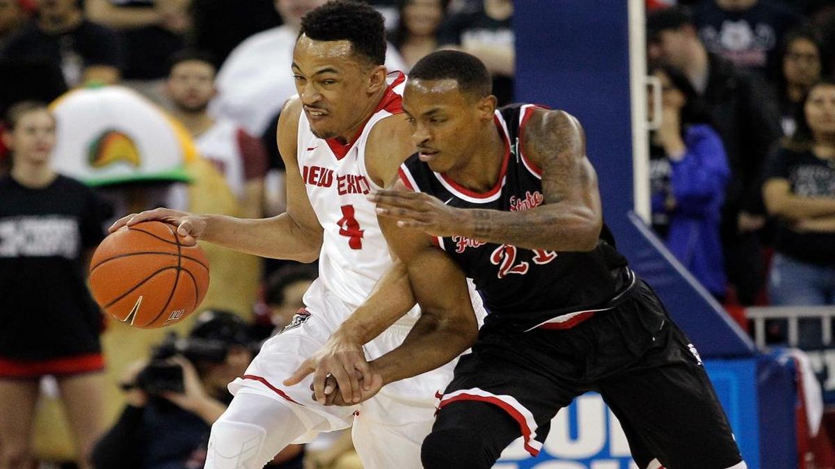 New Mexico’s Elijah Brown drives under pressure from Fresno State’s Deshon Taylor in the first half Saturday, Feb. 18, 2017. Taylor scored 15 points but his big hand in limiting Brown to 11 points and no assists played even larger in the Bulldogs’ 71-61 victory at Save Mart Center.