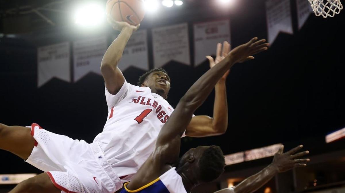 Fresno State point guard Jaron Hopkins collides with Bakersfield’s Fallou Ndoye on a drive to the basket in the first half of the Bulldogs’ 70-55 victory on Tuesday, Dec. 5, 2017 in Fresno. Hopkins went down with a back injury, came back briefly but was ruled out for the rest of the game at halftime.