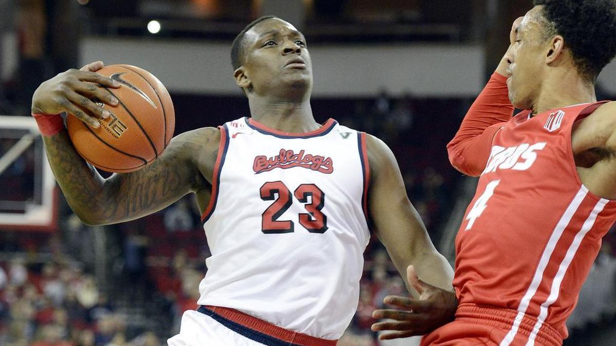 Fresno State’s Marvelle Harris, left, works for a shot against New Mexico’s Elijah Brown at Save Mart Center on Jan. 2, 2016. Harris scored 15 points in that first meeting, but even more of the Bulldogs’ offense has been going through him of late. Over the past six games, the senior guard has averaged 24.8 points, 5.8 rebounds and 5.3 assists per game.