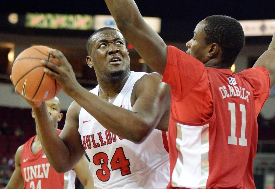 Fresno State center Terrell Carter II, left, works for a shot while defended by UNLV’s Cheickna Dembele in the Bulldogs’ 69-63 victory over the Rebels at the Save Mart Center in Fresno on Tuesday, Jan. 23, 2018. Carter came off the bench and scored 18 points in the victory.