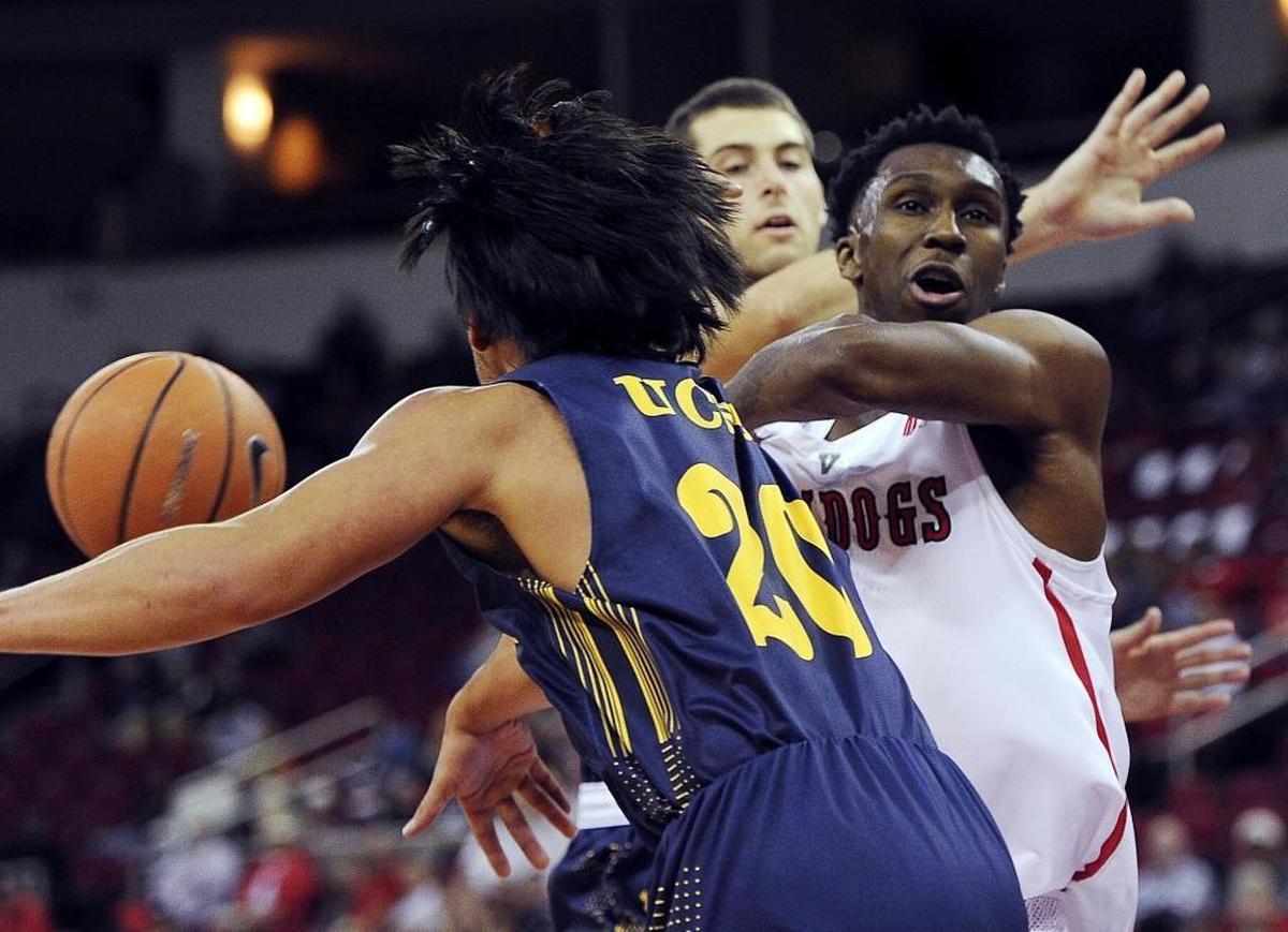 UC Santa Cruz’s Corey Cilia, left, grabs away a rebound from Fresno State’s Jaron Hopkins on Friday, Nov. 10, 2017, at Save Mart Center.