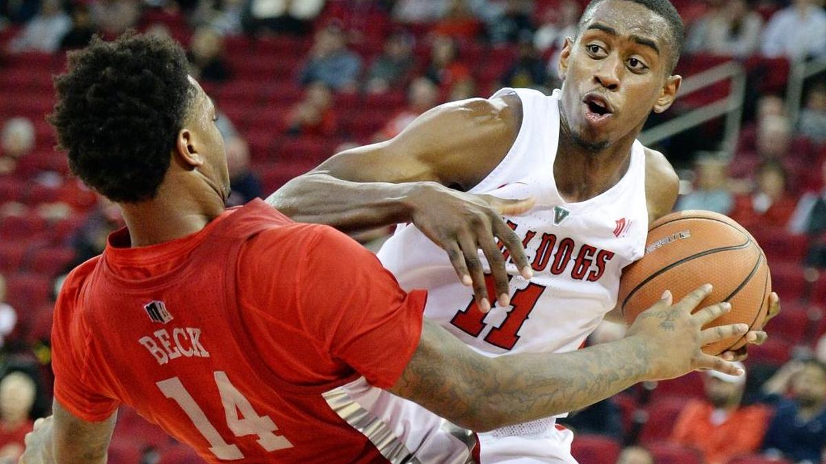 Fresno State forward Bryson Williams, right, scored seven of his 11 points in the second half and three assists when the Bulldogs beat San Diego State 77-73 on Jan. 17, 2018 at Viejas Arena in San Diego. The Bulldogs trailed by 10 points in the second half before rallying.