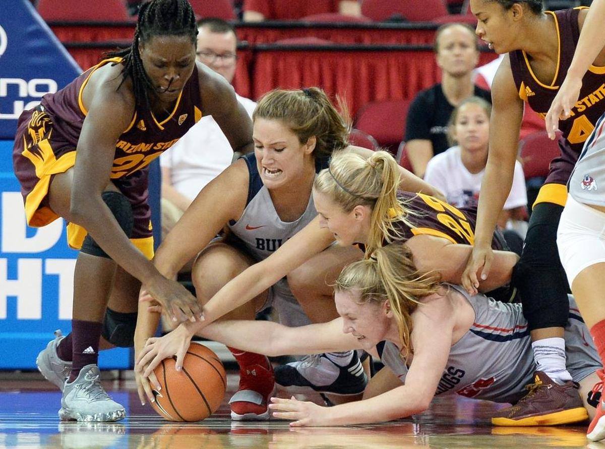 Fresno State’s Breanne Knishka, center, and Bree Delaney get mixed up among Arizona State players while going for a loose ball in the first half of an 81-49 loss to the Sun Devils on Wednesday, Nov. 15, 2017, at Save Mart Center. Fresno State hit just 16 of 57 shots (28.1 perecent) in the loss.