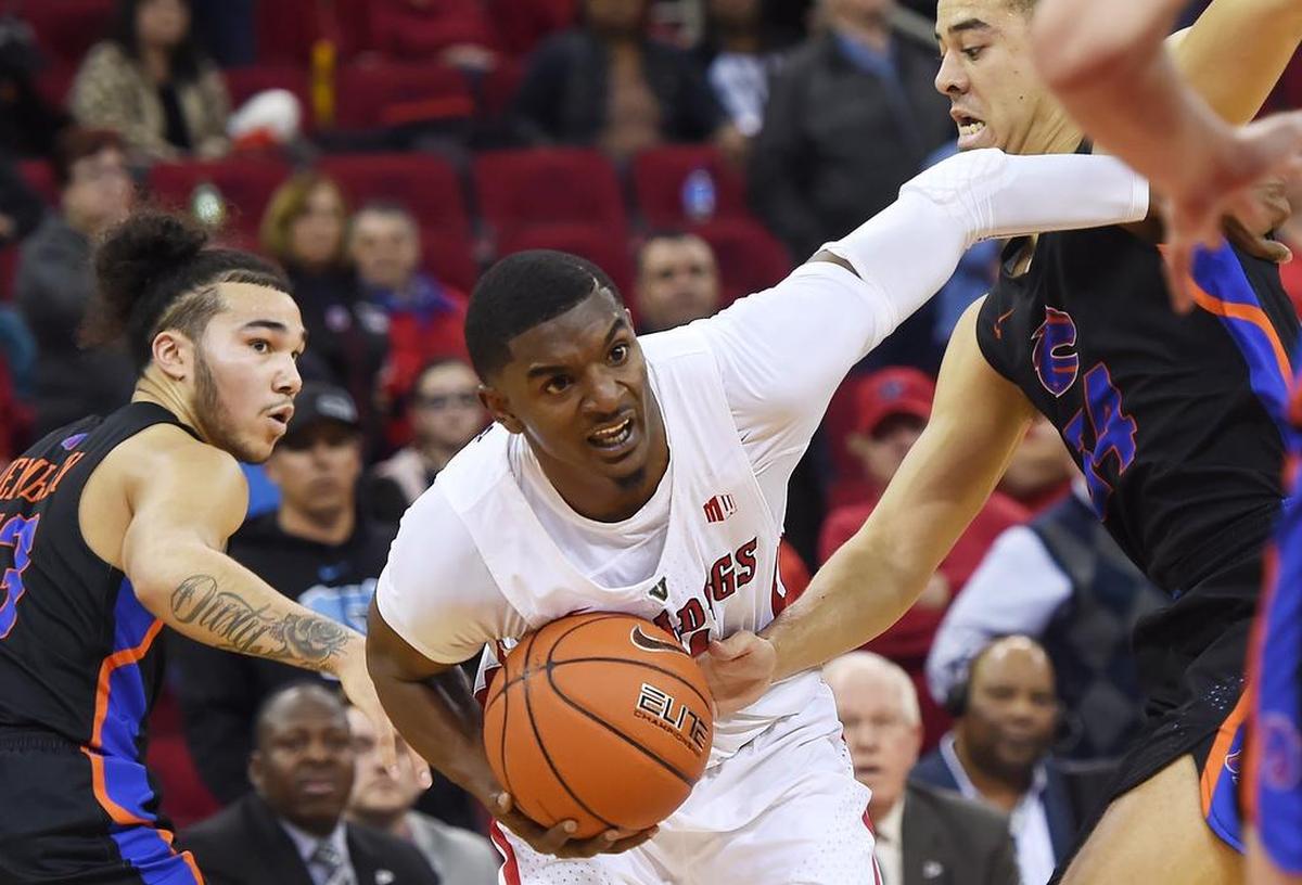 Fresno State guard Braxton Huggins, center, led the Bulldogs with 25 points in their first meeting this season with Nevada, a 74-64 loss at the Save Mart Center. Huggins hit 9 of 17 shots in that game including 5 of 11 from the 3-point line.