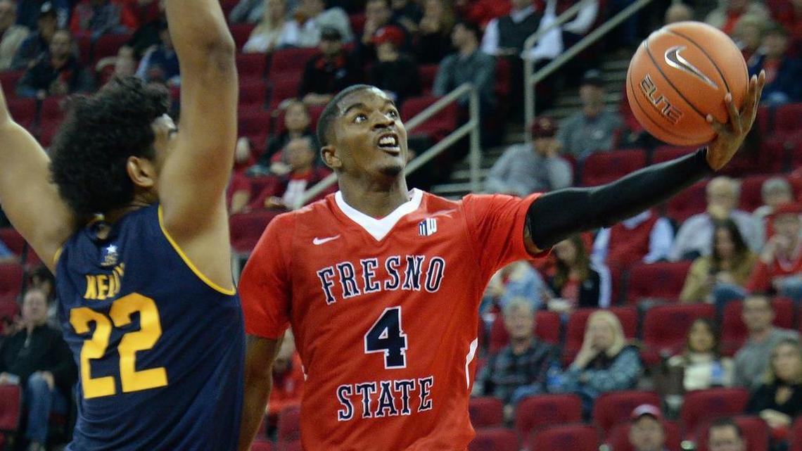 Fresno State’s Braxton Huggins drives against Cal last month. Huggins scored a career-high 33 points Wednesday night in a win at Utah State.